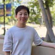 Photo of Ziyan Xie with UCLA campus in the background